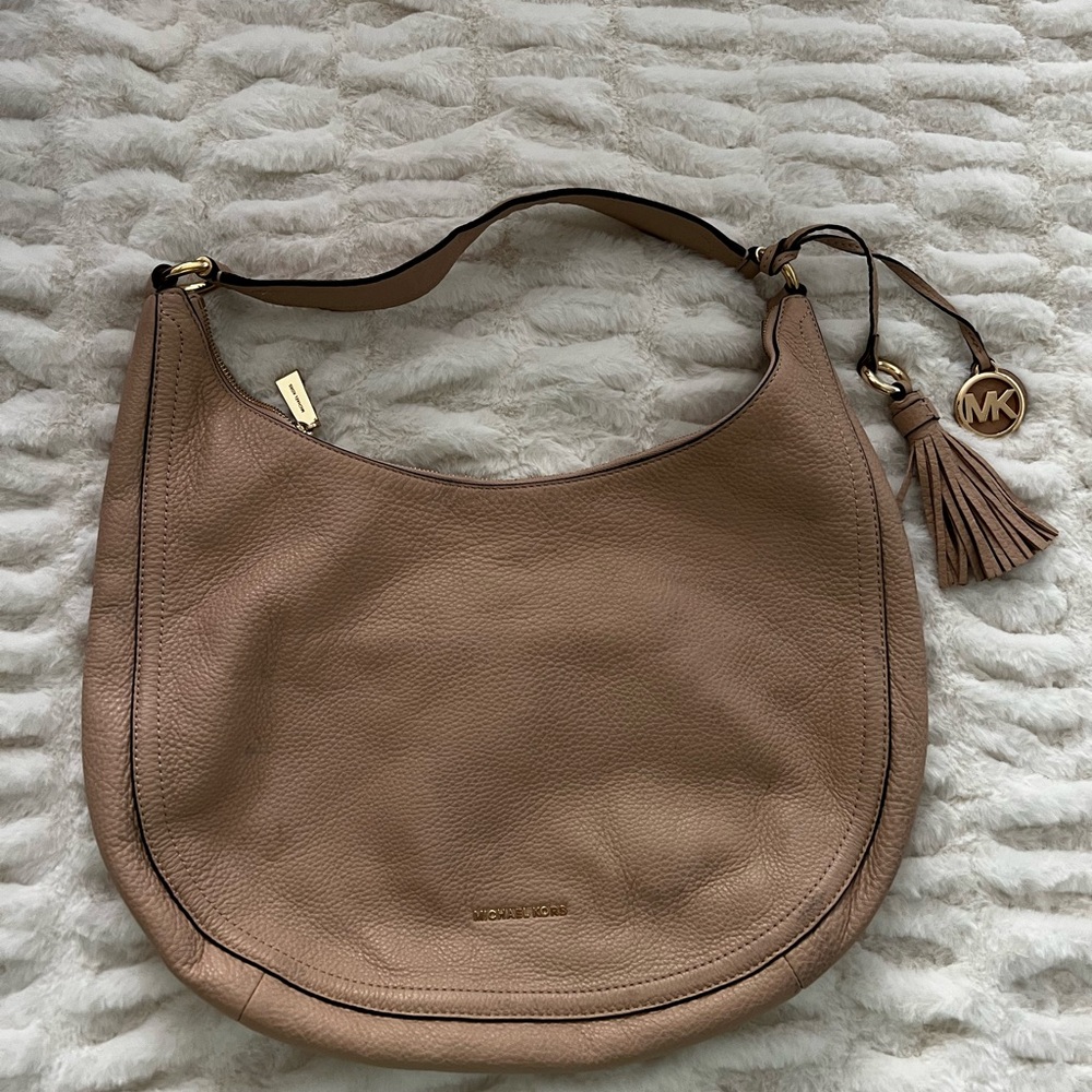 Michael Kors Tan Hobo Bag with Sleek Design